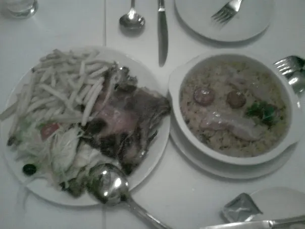 葡式燒乳豬(左) 焗鴨飯(右)