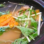 Abalone and Sharks' FIn soup topped with Uni