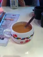 热奶茶不过不失