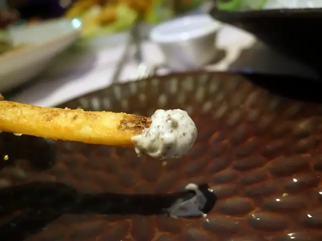 Crispy fries with black truffle mayo