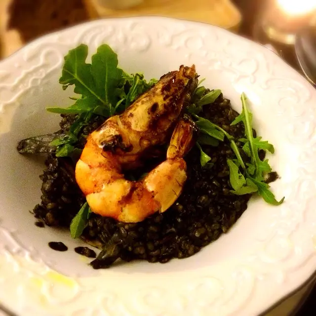 prawn on octopus ink risotto 