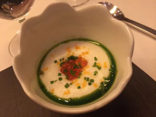 Cauliflower mousse in chive sauce topped with salmon roe