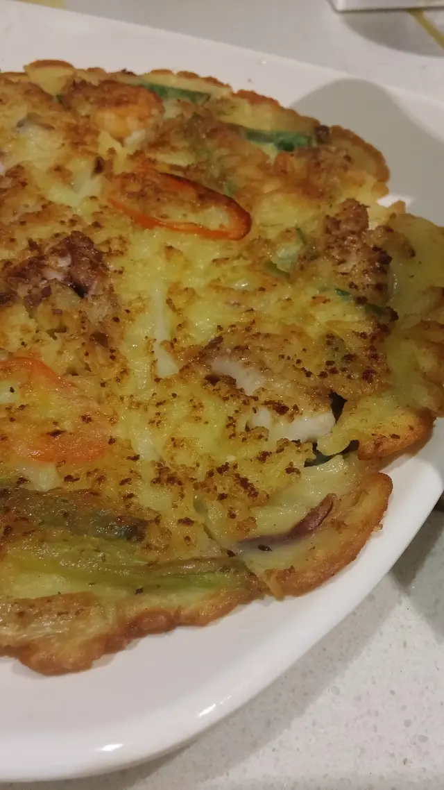 海鮮部分又是少少八爪魚什麼的,還是將重點放在煙韌餅皮上罷了