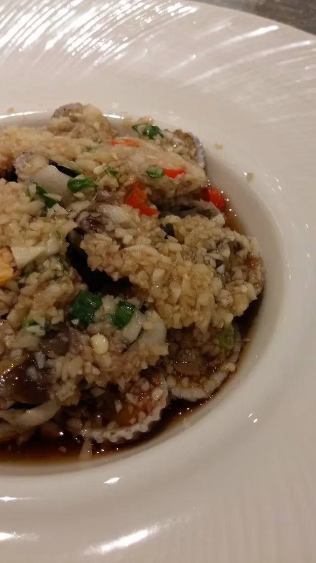 加上帶充足蒜味、辣感及酒香,調和配合得恰到好處,沒有蓋過螄蚶肉的原味鹹香鮮美