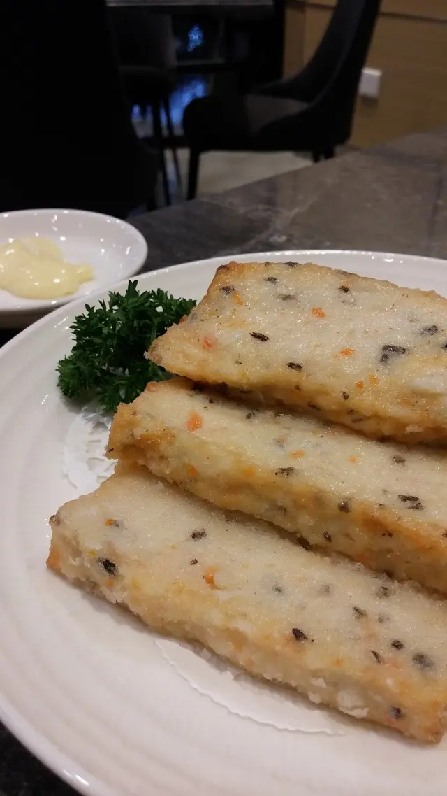 海鮮豆腐細緻香口，不會有人工得過得的調味，可口不過