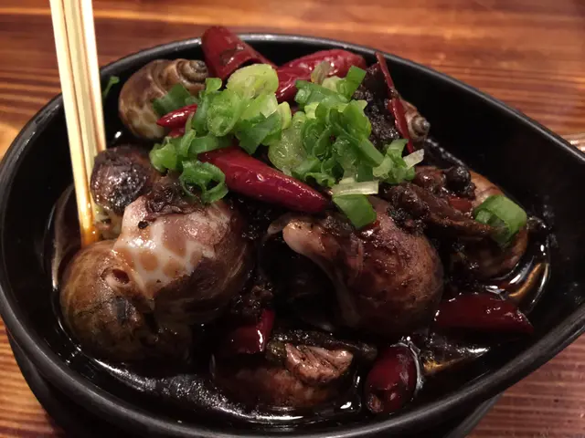 川辣酒煮東風螺