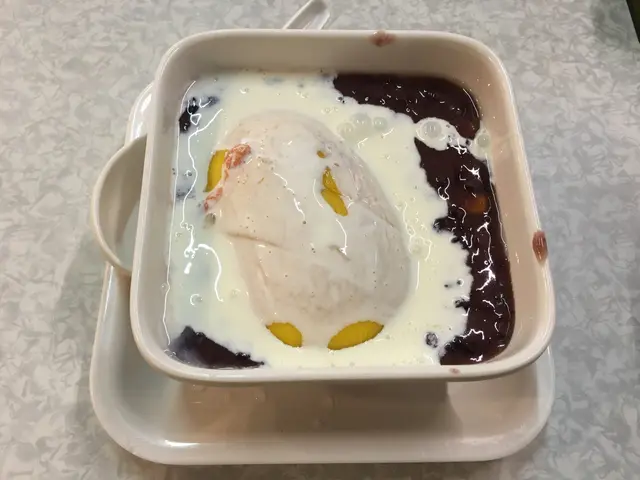 有半個芒果，配埋紫米露，好好味