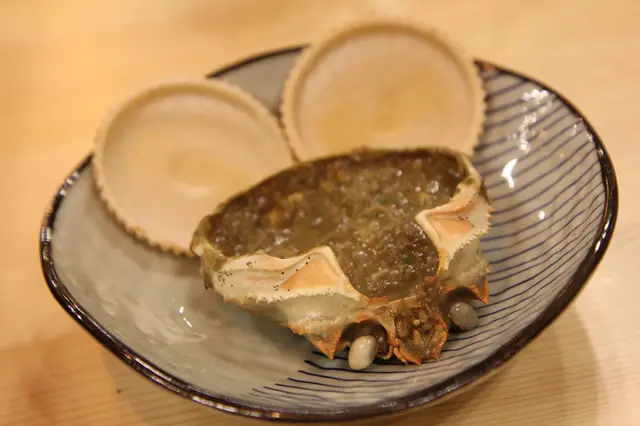 人氣蟹味噌甲羅燒