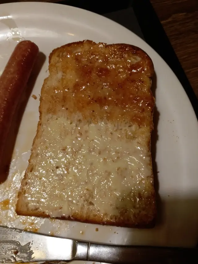 塗o左牛油同果醬o既粗麥多士