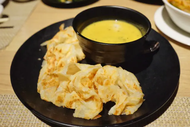 Roti canai with dal curry