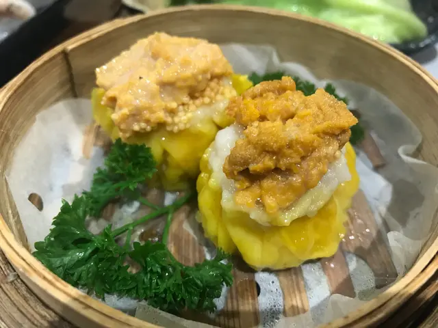 用海膽整燒賣都幾新穎