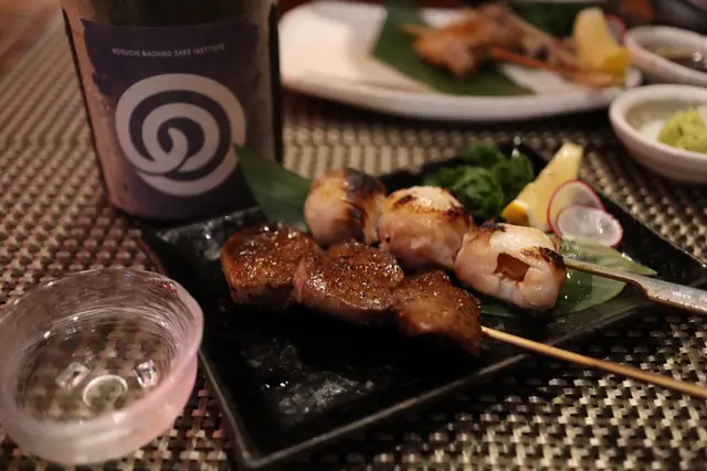 燒牛舌$46 / 荔枝豚肉串$30