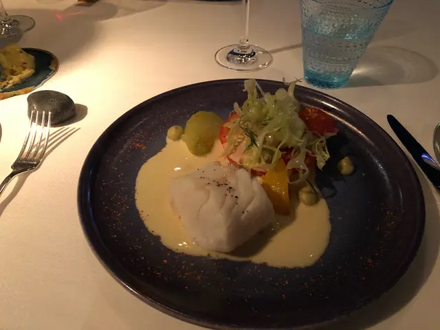 Steamed cod, fennel and heritage tomatoes, shellfish sauce