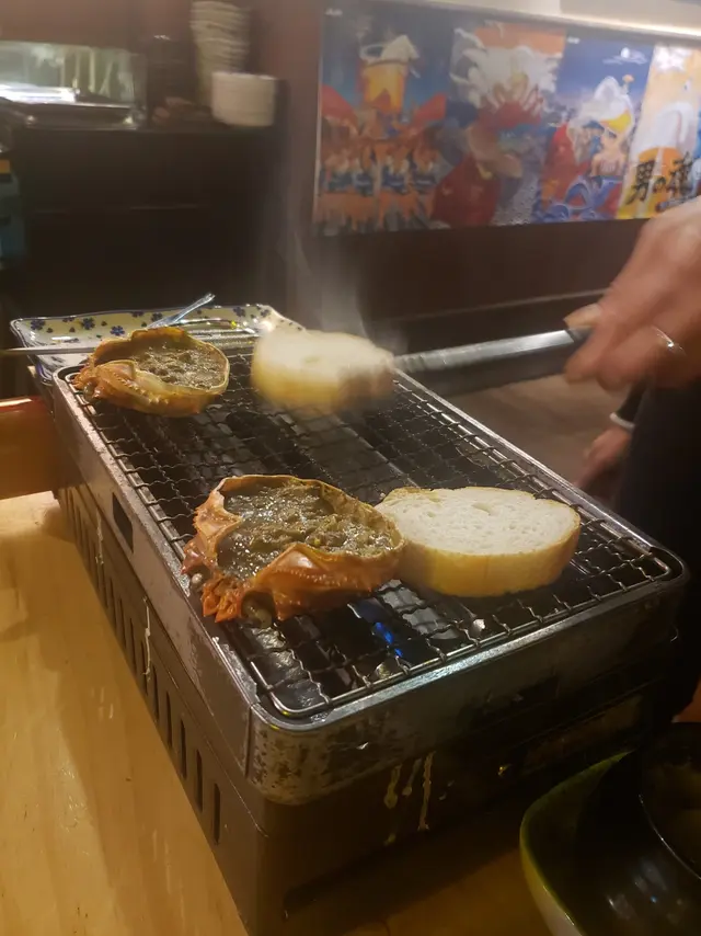 人氣蟹味噌甲羅燒