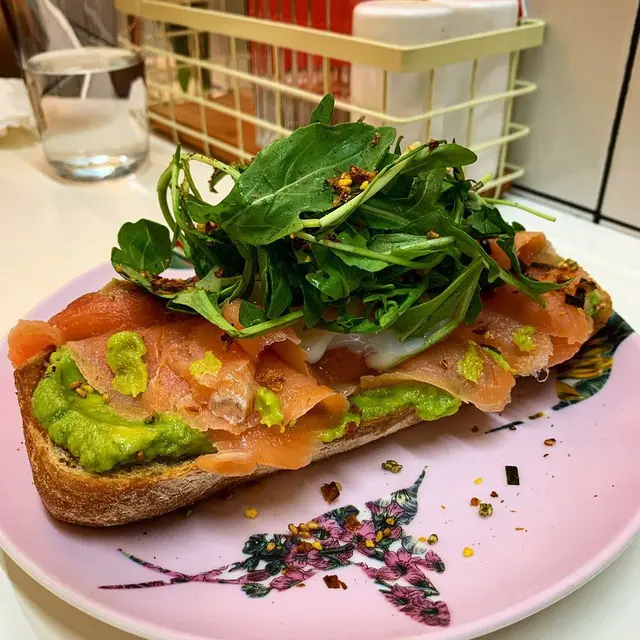 Poached, egg avocado & smoked salmon with wasabi + sourdough