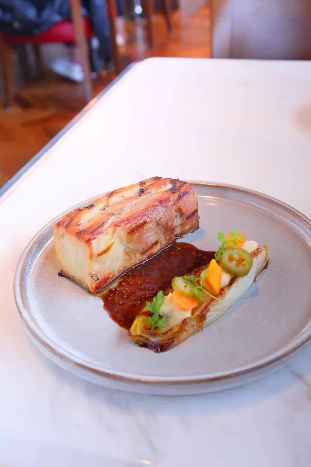 Grilled pork belly, caramelised endive, carrots, mustard sauce
