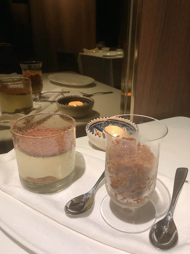Tiramisu served in tumbler glass with Coffee Ice