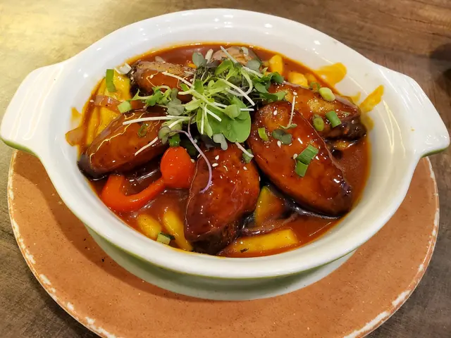 有肉有年糕,甜甜既柚子蜜糖醬,感覺好甜蜜。