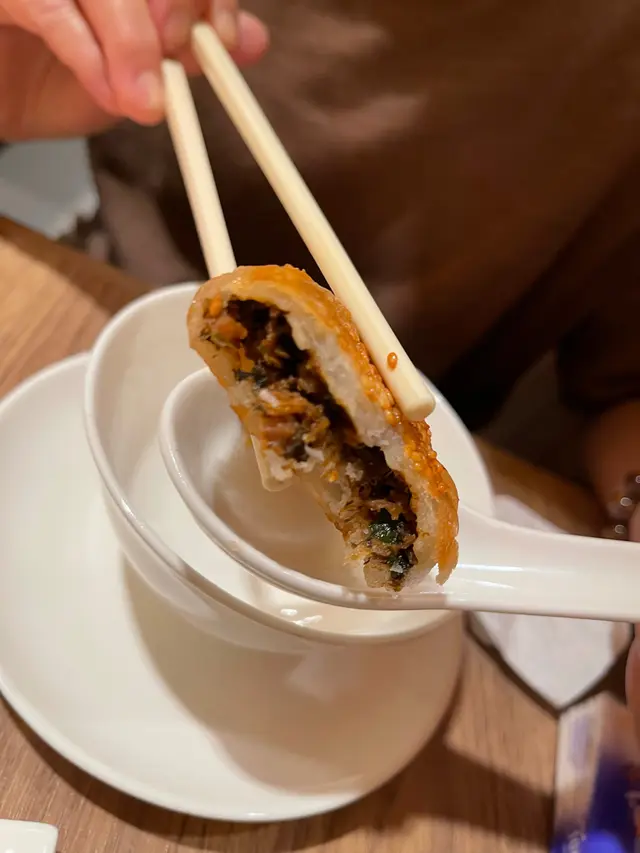 內裏餡料是梅菜