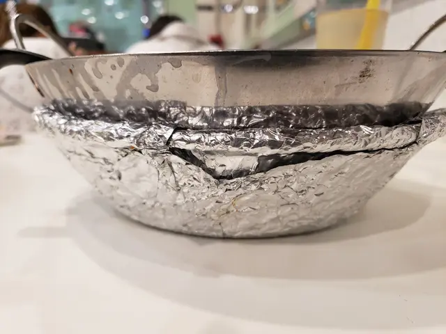 用鍚紙盆來隔熱，第一次見的！