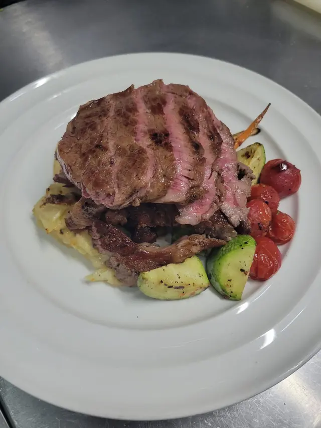 Cream potato with green pepper sauce  rip  eye