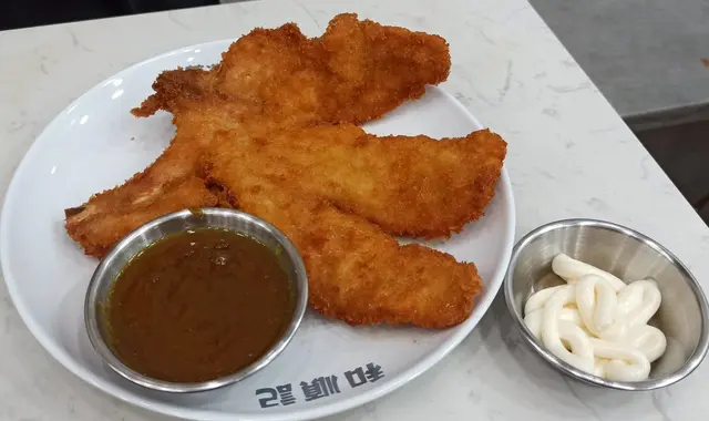 巨型吉列豬扒飯