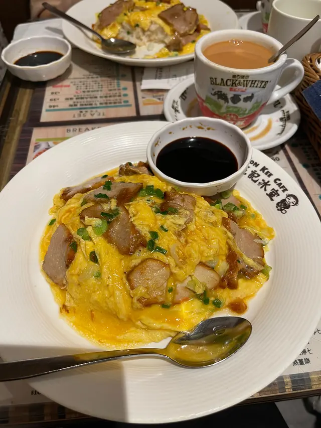 Classic HK rice dish! Really good egg and char siu was pretty tender as well. The homemade soy sauce and scallions were def the stars of the show!