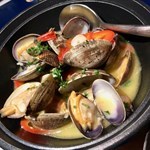 NY Manila clams in a white wine cherry tomato broth with onion, garlic, basil, and parsley