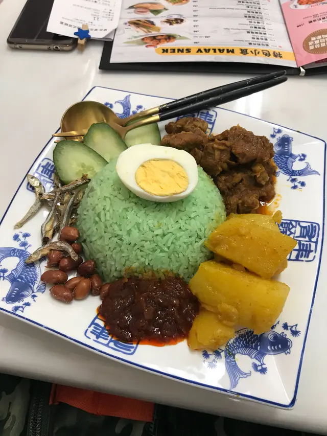 仁噹牛肉配椰漿飯