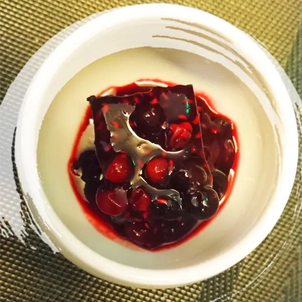 Chocolate brownie with mix berry sauce