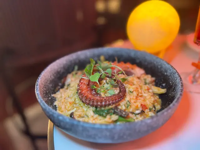 Spanish Octopus Leg Risotto with Tomato Lobster Sauce