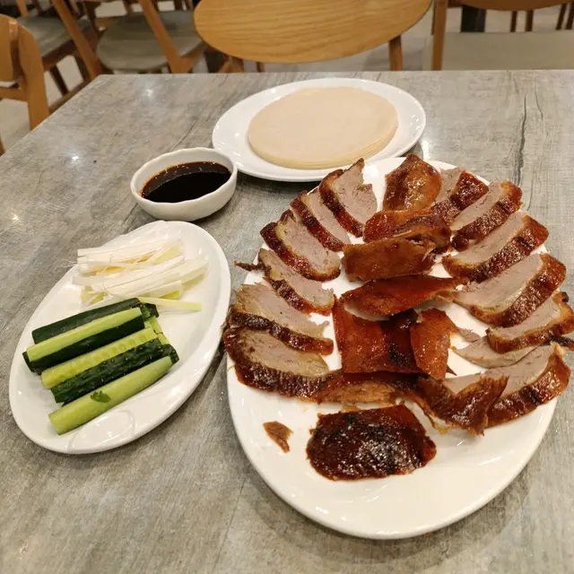 北京填鴨（半隻)（跟一份摩摩皮約20塊)