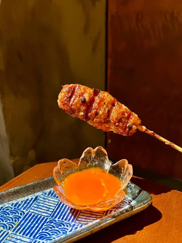 手打免治雞肉棒附月見