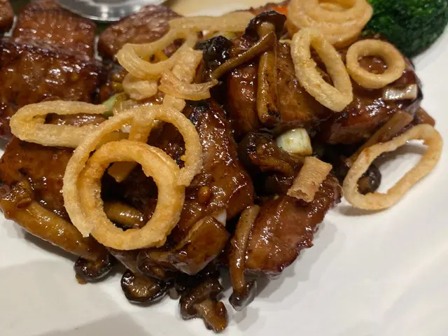 Sautéed Miyazaki Wagyu beef with spring onions in wasabi soy sauce