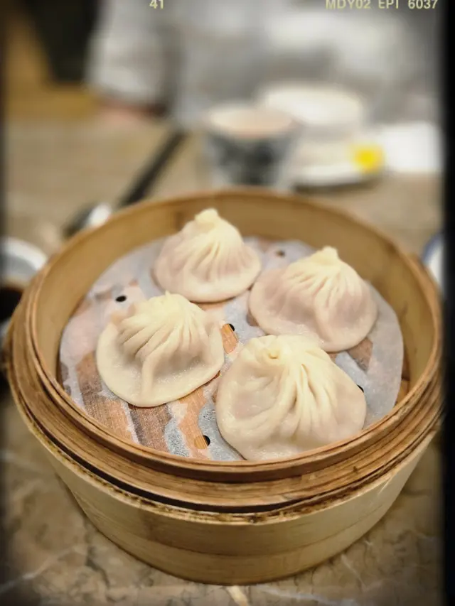 江南小籠包（$55/四粒）