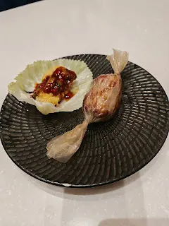 纸包骨拼石本酒焗蠔