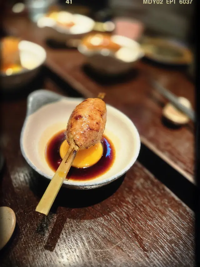 免治雞肉棒（$58/串）