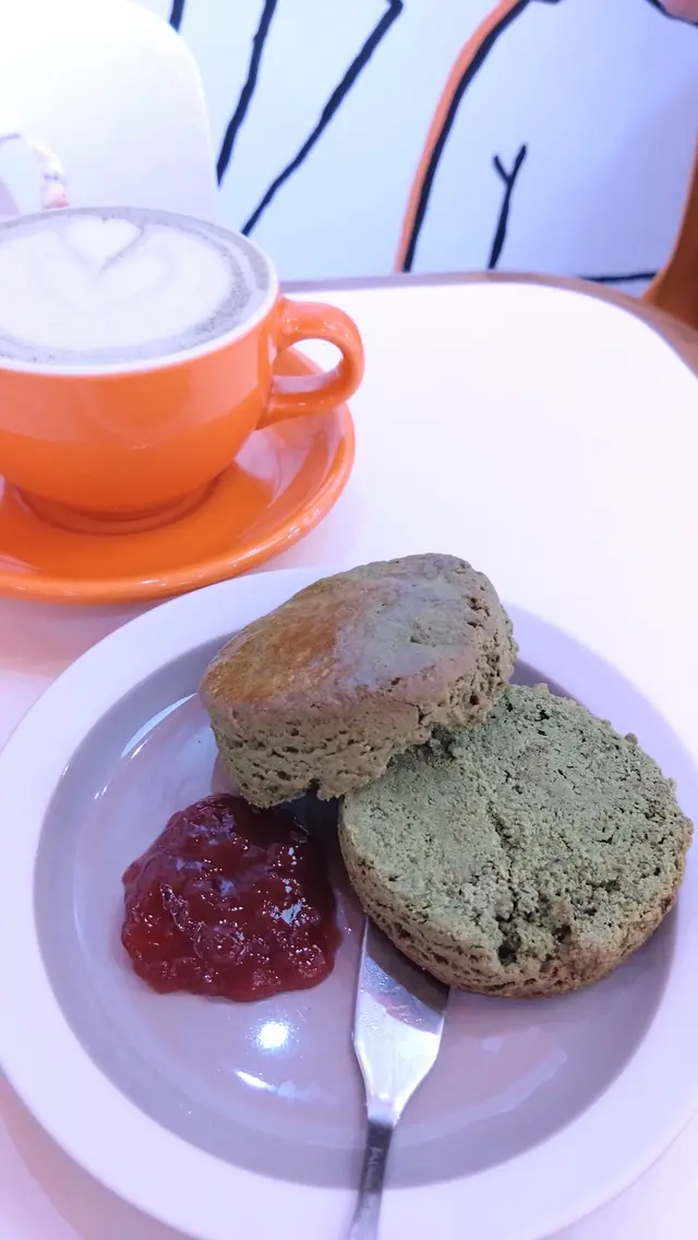Matcha scone with strawberry jam