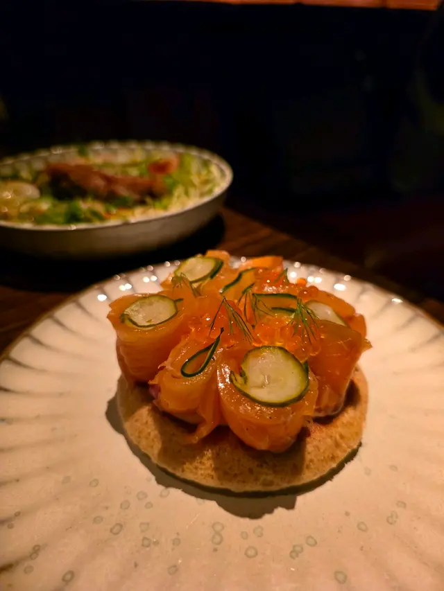 Home Cured & Smoked Tasmanian Trout on Buckwheat Blini with Sour Cream, Pickled Cucumber & Trout Roe