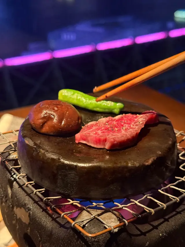 Stone-grilled wagyu and crispy garlic chips served with three sauces: onion and garlic - sour soy - sansho pepper soy