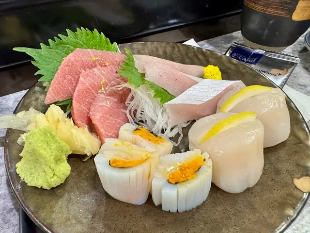 O-toro,  fatty  yellow  tail,  scallops,  squid  with  uni
