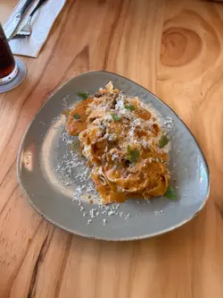 Short Rib Ragù: Slow simmered tomatoes, chervil, cream with tagliatelle