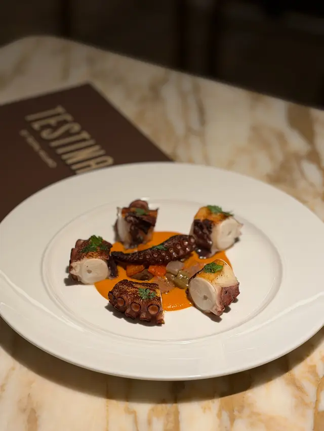 Roasted Mediterranean Octopus, Capers & Dry Tomato Oil, Romesco Sauce